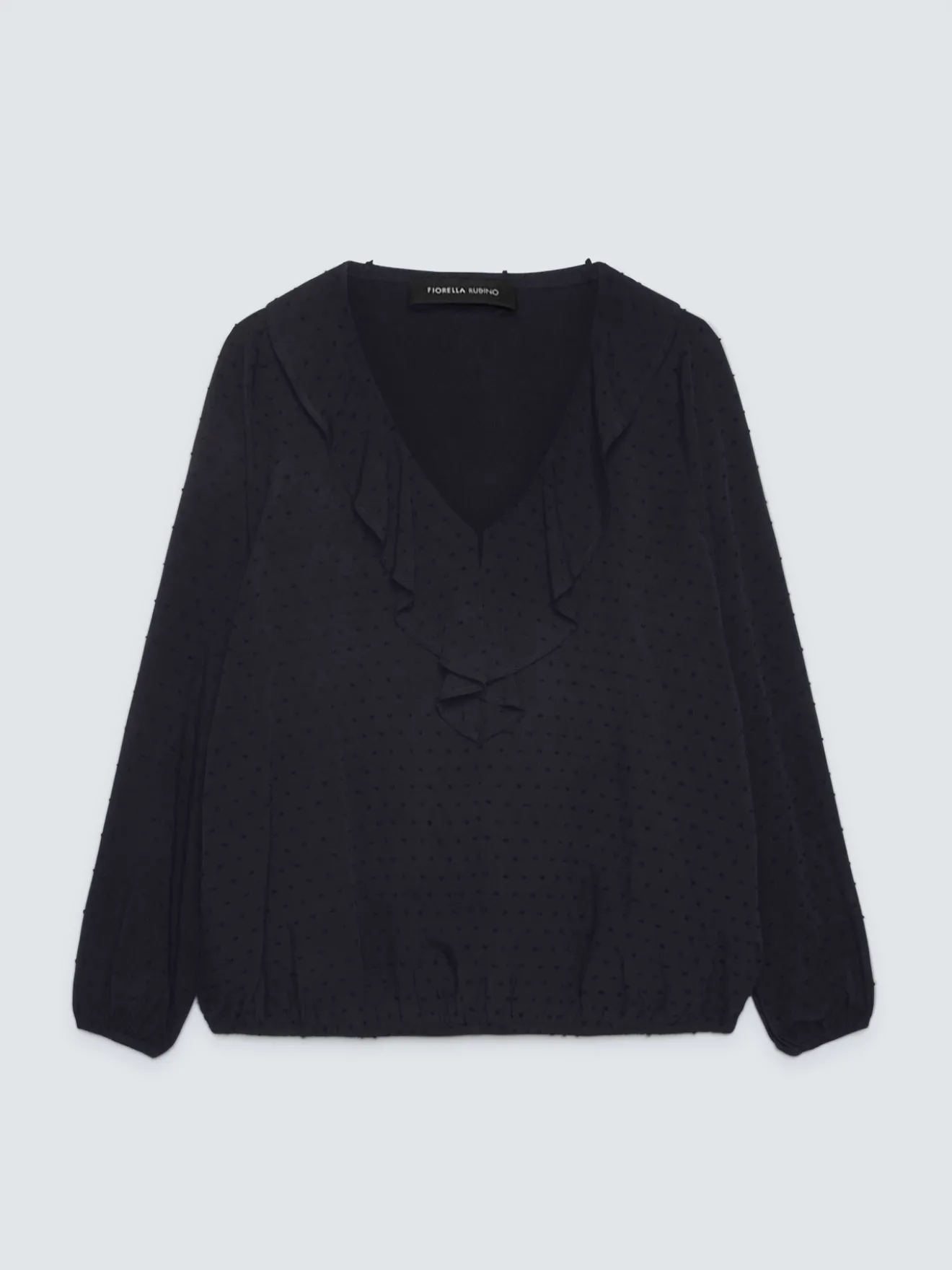 Blusa in plumetis a pois con volant