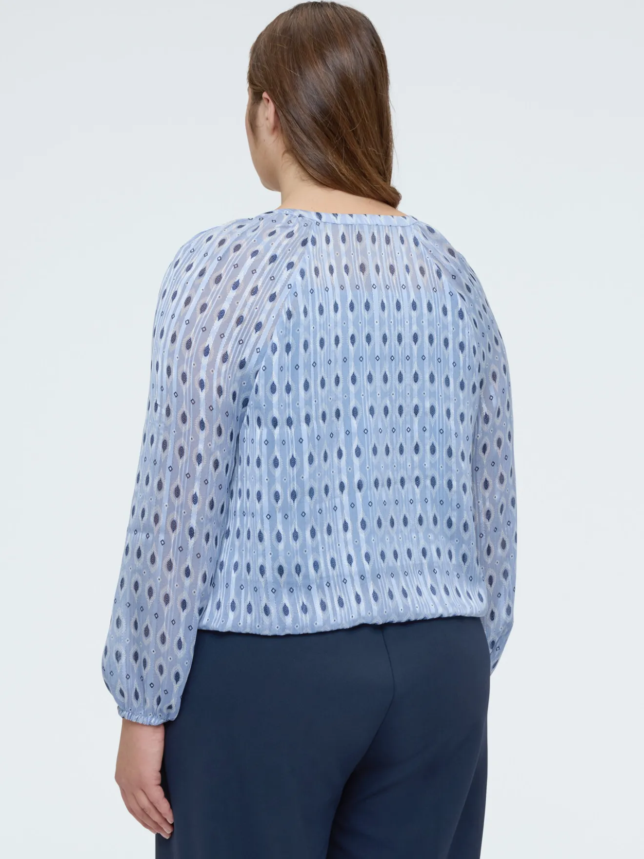 Blusa in tessuto lurex con stampa