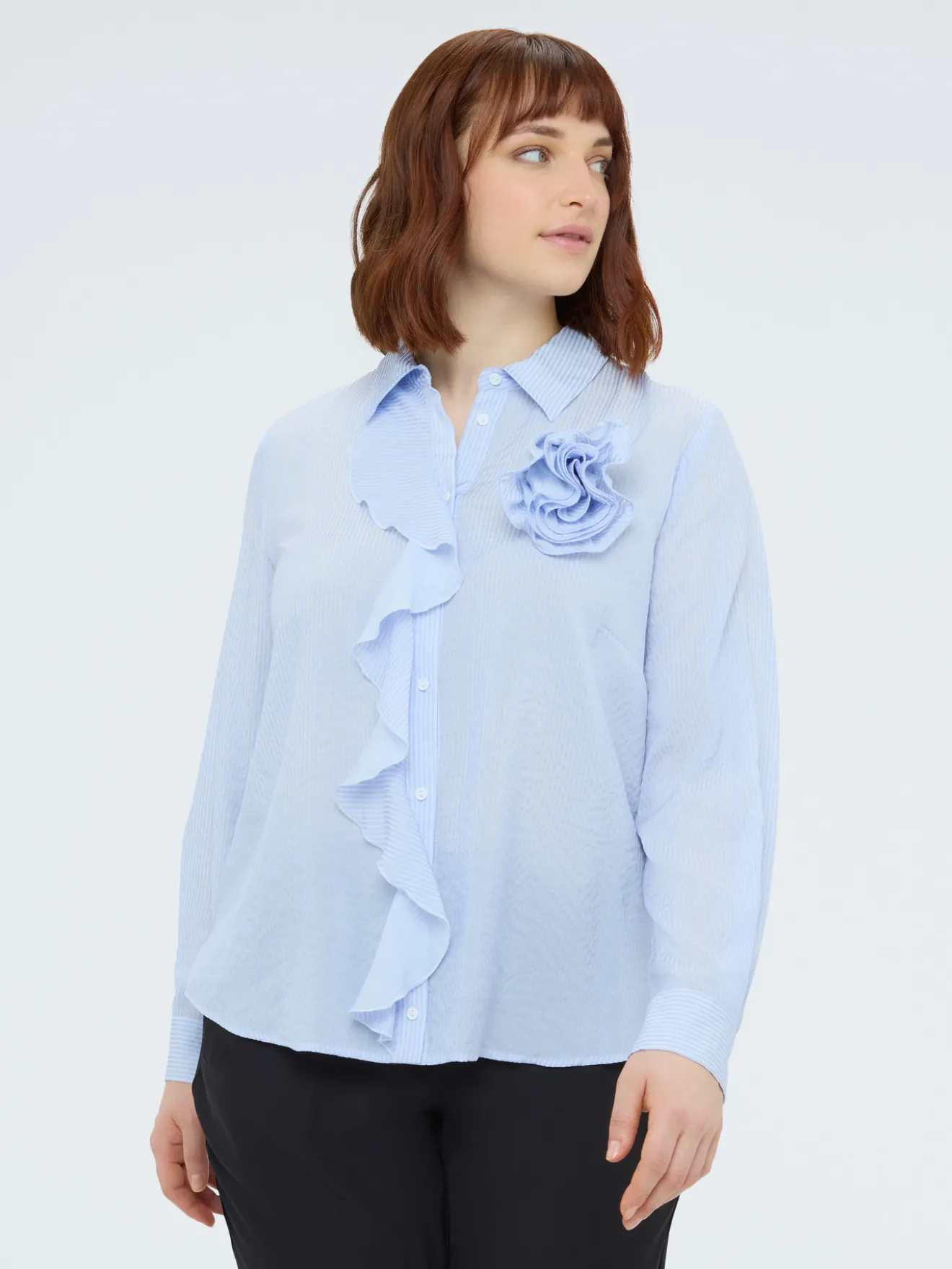 Camicia con volant e fiore
